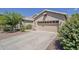 Charming single-Gathering home featuring a two-car garage and a well-maintained front yard at 5926 W Questa Dr, Glendale, AZ 85310