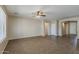 Bright living room features tile flooring and arched doorways, adding architectural interest at 5926 W Questa Dr, Glendale, AZ 85310