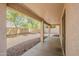 This home features a covered patio with a view of the spacious backyard with mature landscaping at 5926 W Questa Dr, Glendale, AZ 85310