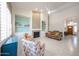 Inviting living room with a fireplace, built-in bookshelves, and tile flooring perfect for entertaining at 6135 E Aire Libre Ln, Scottsdale, AZ 85254