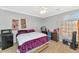 Bedroom with a double bed, carpeting, and natural light from the window at 648 W Cobblestone Dr, Casa Grande, AZ 85122