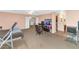 Open bedroom featuring a ceiling fan, desk, and carpeted floor at 648 W Cobblestone Dr, Casa Grande, AZ 85122