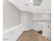 Spacious hallway with a storage cabinet and neutral carpet at 648 W Cobblestone Dr, Casa Grande, AZ 85122