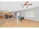 Open floorplan featuring a kitchen, dining area, and a game area at 648 W Cobblestone Dr, Casa Grande, AZ 85122
