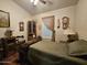 Comfortable bedroom with decorative accents and ample lighting at 650 N Hawes Rd # 4123, Mesa, AZ 85207