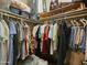 Walk-in closet with organized clothing racks and shelving at 650 N Hawes Rd # 4123, Mesa, AZ 85207