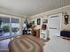 Bright room featuring an area rug and outdoor access at 650 N Hawes Rd # 4123, Mesa, AZ 85207