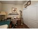 Cozy office space with sewing machine setup and ample storage at 650 N Hawes Rd # 4123, Mesa, AZ 85207