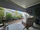 Cozy patio area overlooking the landscaped yard with outdoor seating at 650 N Hawes Rd # 4123, Mesa, AZ 85207