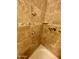 Tiled shower showcasing bronze fixtures, decorative tile border, and functional soap dish at 6512 E Portia Cir, Mesa, AZ 85215
