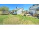 Backyard with grass, a trampoline and ' playset at 6826 S 16Th Way, Phoenix, AZ 85042