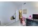 Bedroom featuring workspace, a playful vibe, and ample storage at 6826 S 16Th Way, Phoenix, AZ 85042