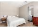 Inviting bedroom boasts plank flooring, neutral paint, and bright natural light at 6870 S Crestview Dr, Gilbert, AZ 85298
