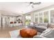 Open concept living room and kitchen featuring an island and sliding glass doors at 6870 S Crestview Dr, Gilbert, AZ 85298