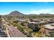 Stunning aerial view of community with views of mountains and city at 7137 E Rancho Vista Dr # 6011, Scottsdale, AZ 85251