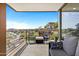 Relaxing balcony with cushioned seating and scenic views at 7137 E Rancho Vista Dr # 6011, Scottsdale, AZ 85251
