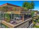 Exterior view of a modern terraced building with lush landscaping at 7137 E Rancho Vista Dr # 6011, Scottsdale, AZ 85251