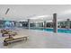 A bright indoor pool with sleek design, ample space, and comfortable lounge chairs at 7137 E Rancho Vista Dr # 6011, Scottsdale, AZ 85251