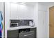 Built-in drink refrigerator and cabinet space at 7137 E Rancho Vista Dr # 6011, Scottsdale, AZ 85251