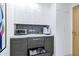 Built-in drink refrigerator and cabinet space at 7137 E Rancho Vista Dr # 6011, Scottsdale, AZ 85251