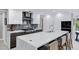 Modern kitchen with a large island and high-end appliances at 7137 E Rancho Vista Dr # 6011, Scottsdale, AZ 85251