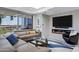 Cozy living room with a fireplace, modern furniture, and a balcony view at 7137 E Rancho Vista Dr # 6011, Scottsdale, AZ 85251