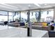 Relaxing living room with sectional seating, modern decor and floor to ceiling windows at 7137 E Rancho Vista Dr # 6011, Scottsdale, AZ 85251