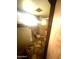 Bathroom needing repair, featuring a shower and toilet, and other stored items at 7139 E Arcadia Cir, Mesa, AZ 85208
