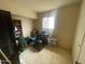 Room with items in storage, a window letting in natural light, and neutral walls at 7139 E Arcadia Cir, Mesa, AZ 85208