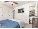 Bedroom with attached bathroom and neutral color palette at 7727 E 4Th St, Scottsdale, AZ 85251