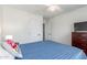 Comfortable bedroom with ceiling fan, neutral colors, and ample natural light at 7727 E 4Th St, Scottsdale, AZ 85251