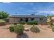 Charming single-story home with desert landscaping, providing a low-maintenance and attractive exterior at 7727 E 4Th St, Scottsdale, AZ 85251
