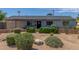 Charming single-story home with desert landscaping, providing a low-maintenance and attractive exterior at 7727 E 4Th St, Scottsdale, AZ 85251