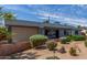 Quaint home featuring low-maintenance desert landscaping and a cozy, inviting front entrance at 7727 E 4Th St, Scottsdale, AZ 85251