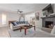 Cozy living room featuring a fireplace, comfortable seating, and stylish decor, perfect for relaxation at 7727 E 4Th St, Scottsdale, AZ 85251