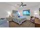 Bright, spacious bedroom featuring stylish decor, plush bedding, and ample natural light at 8300 E Lone Mountain Rd, Scottsdale, AZ 85266