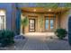 Inviting desert home entrance featuring a stone walkway and desert landscaping at 8300 E Lone Mountain Rd, Scottsdale, AZ 85266