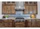 Modern kitchen with stainless steel appliances, custom cabinets, and granite countertops at 8300 E Lone Mountain Rd, Scottsdale, AZ 85266