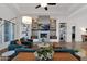 Living room boasts a sleek fireplace, modern decor and plenty of natural light at 8300 E Lone Mountain Rd, Scottsdale, AZ 85266
