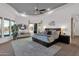 Large main bedroom features tray ceilings, sitting area, and outdoor views at 8300 E Lone Mountain Rd, Scottsdale, AZ 85266