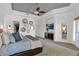Tranquil main bedroom showcases large bed, soft rug, and walk-in closet at 8300 E Lone Mountain Rd, Scottsdale, AZ 85266