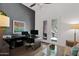 Well-lit home office with a view of the desert landscape at 8300 E Lone Mountain Rd, Scottsdale, AZ 85266