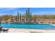 Beautiful pool with a water feature, cacti, and desert mountain views at 8300 E Lone Mountain Rd, Scottsdale, AZ 85266