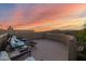 This rooftop deck boasts comfortable outdoor seating for relaxing and enjoying the sunset with mountain views at 8300 E Lone Mountain Rd, Scottsdale, AZ 85266