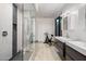 Modern bathroom with double sinks, walk-in shower, and exercise equipment at 8312 N Golf Dr, Paradise Valley, AZ 85253