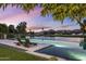 Tranquil pool setting with comfortable lounge chairs and picturesque landscape at 8312 N Golf Dr, Paradise Valley, AZ 85253