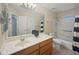 Clean bathroom featuring a shower/tub combo with a wood vanity at 8339 W Bluefield Ave, Peoria, AZ 85382