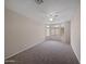 Spacious bedroom with a large bay window and plush carpet flooring at 8339 W Bluefield Ave, Peoria, AZ 85382