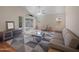 Cozy living room with stylish furniture, ceiling fan, and sliding door at 8339 W Bluefield Ave, Peoria, AZ 85382
