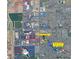 Aerial view highlighting the property's proximity to schools, retail, and entertainment venues at 8981 W Tuckey Ln, Glendale, AZ 85305